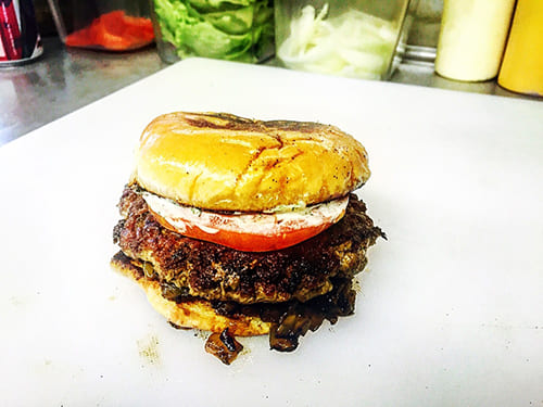Wolfman Catering Bolivar Burger served with fresh ingredients
